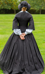 Fototapeta premium Victorian woman in outdoor setting
