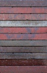CLOSE UP IMAGE OF STACKED CONCRETE TILES