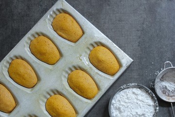 Fresh Baked Madeleines in a pan overhead view