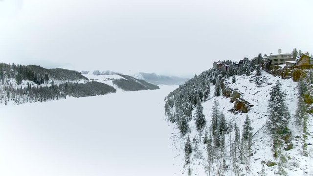 Houses on a cliff.  4k aerial drone footage of homes in the Colorado Rocky Mtns