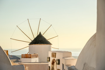 Windmill in Oia village on Santorini island - obrazy, fototapety, plakaty