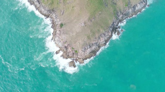 4k aerial view drone shot of beautiful mountain and tropical sea in summer season Location at Laem Krating Phuket Thailand