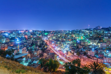 Cityscape Amman downtown at dusk, Panoramic view from the citadel hill. Capital of Jordan.