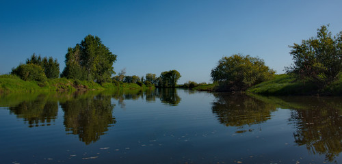 Russia. The South Of Western Siberia. Summer windless day on the Ob river