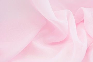 Texture chiffon fabric pink color for backgrounds 