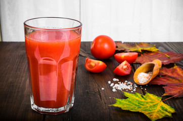 Natural juice with pulp from fresh ripe red tomatoes
