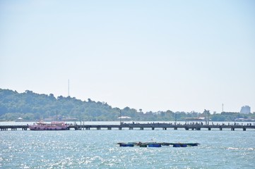 Obraz na płótnie Canvas a beautiful view of Fishing harbor and bridge in Samed Island, Rayong, Thailand