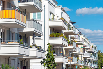 Lots of balconies of modern apartment houses seen in Berlin, Germany