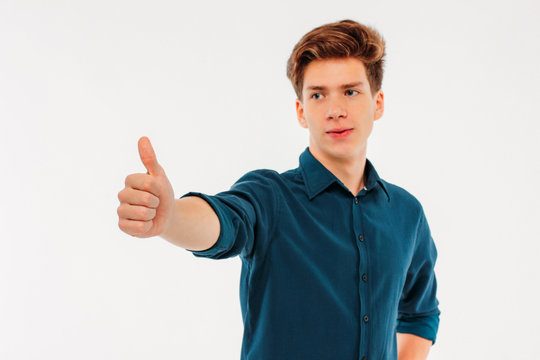 Attractive Smiling Boy 18 Years Old Student Showing Thumbs Up On