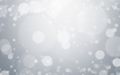 Silver light background with blur bokeh. beautiful christmas backdrop. festive defocused. cosmetic advertising design