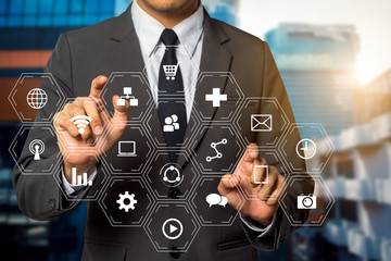 Data Management System with businessman working with provide information for Key Performance Indicators and marketing analysis virtual computer 