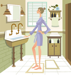 Side profile of a woman standing with her hand on her hip in the bathroom