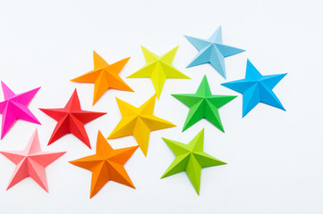 A star made of rainbow-colored paper