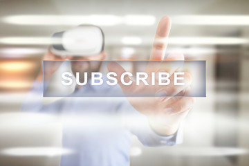 Subscribe now, subscription, newsletter button on virtual screen.