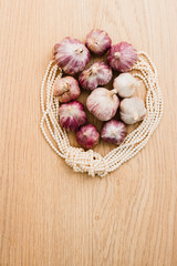 white and purple garlic and pearl threads