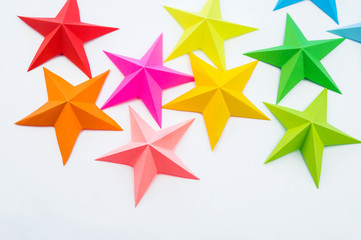 A star made of rainbow-colored paper