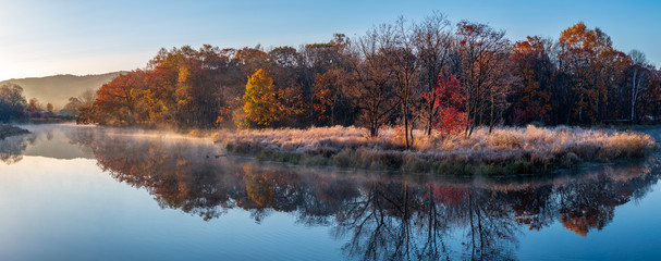 Autumn landscape of early foggy morning in the far east of Russia.