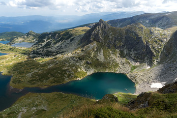 Fototapeta na wymiar Summer view of The Twin, The Trefoil, The Fish and The Lower lakes, Rila Mountain, The Seven Rila Lakes, Bulgaria
