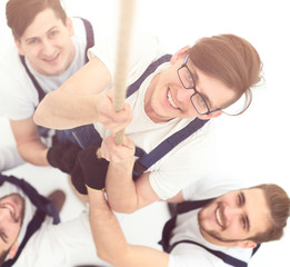 Fototapeta premium group workers hold on to the rope.isolated on white