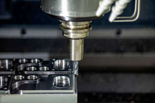 The CNC milling machine cutting the forging mold part by solid radius end mill tool.Mold manufacturing process.