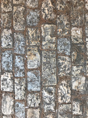 Texture, background, wall of large natural, untreated stones