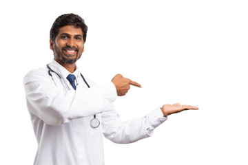 Doctor pointing at invisible object in palm.