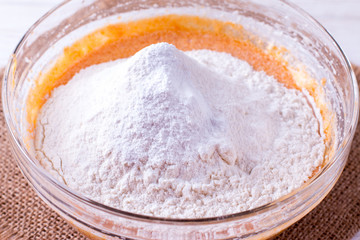 Flour in a bowl with dough