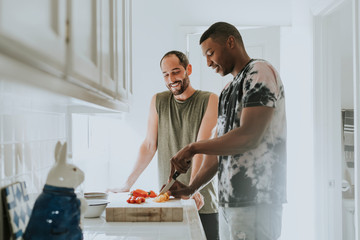 Couple cooking in kitchen - Powered by Adobe