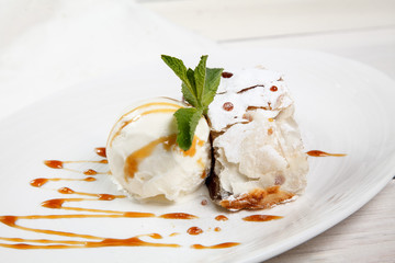 Slice of apple strudel with vanilla ice cream