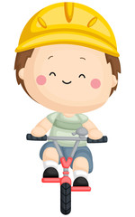 a boy riding his bicycle while wearing a helm