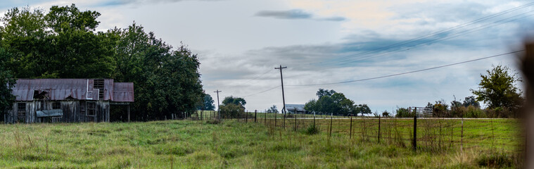 Country rural panorama with abandoned house