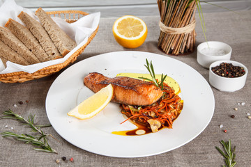 Grilled salmon steak slices