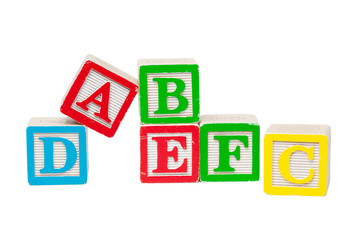 Wooden alphabet blocks isolated on white background