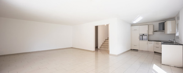 White kitchen in empty apartment