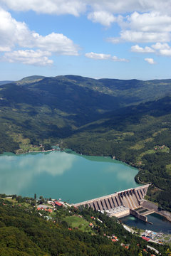 hydroelectric power plant Perucac on Drina river and hills landscape Serbia