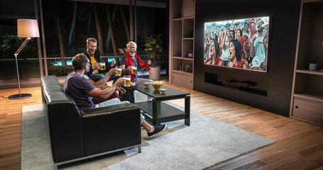 Group of fans are watching a soccer moment on the TV and celebrating a goal, sitting on the couch in the living room.