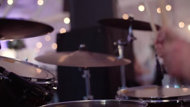 Drum sticks knock on different drums cymbals. HD