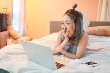 beautiful and sexy woman using laptop computer before go to sleep