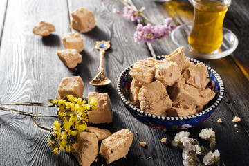 Tasty halva with tea on the table