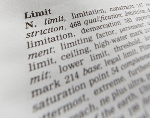 CLOSE UP OF DICTIONARY PAGE SHOWING DEFINITION OF THE WORD LIMIT