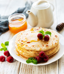 Delicious pancakes with raspberries