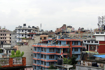 Fototapeta na wymiar The typical buildings and tenements (including the prayer flags) around Kathmandu