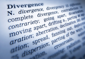 CLOSE UP OF DICTIONARY PAGE SHOWING DEFINITION OF THE WORD DIVERGENCE