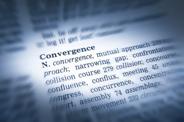 CLOSE UP OF DICTIONARY PAGE SHOWING DEFINITION OF THE WORD CONVERGENCE