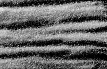 Crystal sugar pile isolated on black background with clipping path