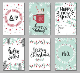 Set of christmas greeting cards with hand written lettering and design elements