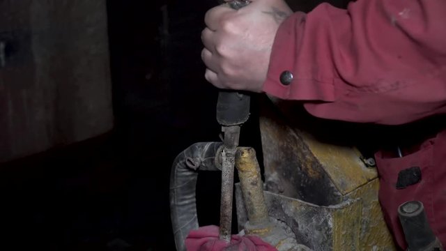 worker presses the lever