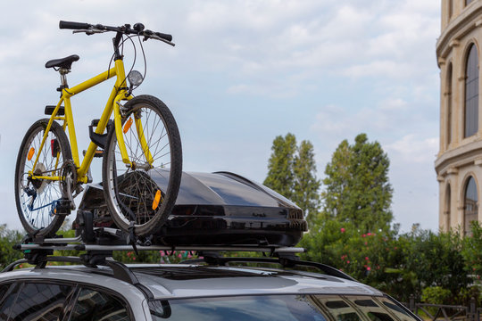 Transportation Of Bicycles On The Roof Of The Car. Concept: A Car Trip With A Bike