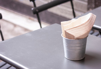 Table and chairs in an outdoor cafe in Syracuse (Siracusa) Sicily