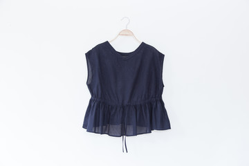 Blue blouse on white background.minimal style